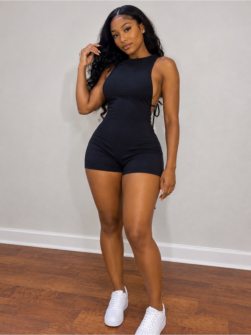 Blue Sleeveless Side-Tie Romper with the backout
